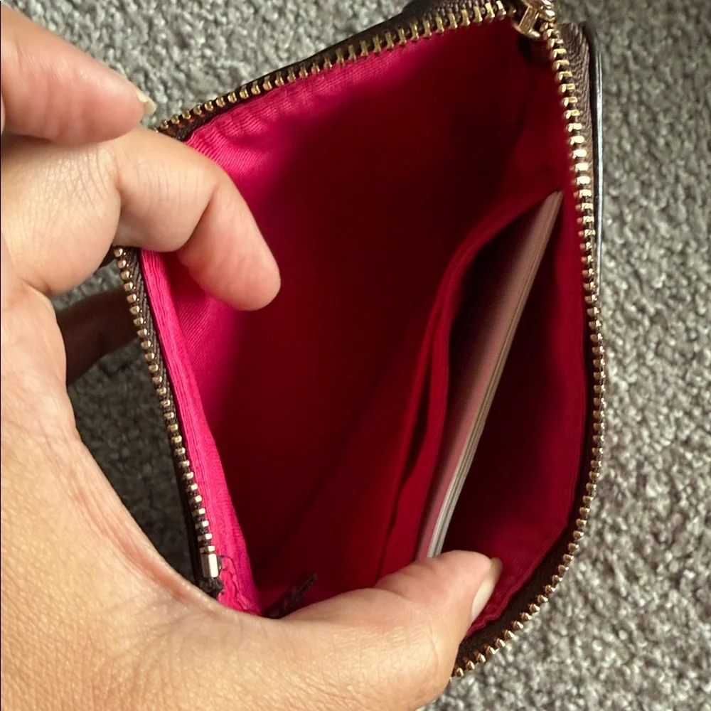 Coach Brown Signature Canvas Wristlet with Hot Pink Center Stripe